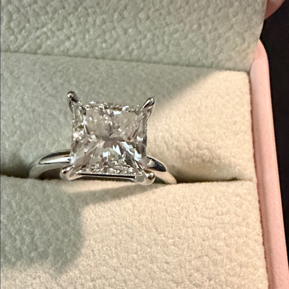 Princess cut diamond ring, 3 carat stone, white gold band, 6 1/2, IGI certified.